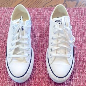 Converse platform tennis shoes.   Size 7